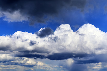 Beautiful white cloud formations in a deep blue sky on a sunny day