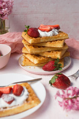 Homemade belgian Waffle. Strawberies and whiped cream.