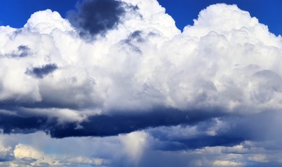 Beautiful white cloud formations in a deep blue sky on a sunny day