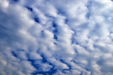 Beautiful white cloud formations in a deep blue sky on a sunny day
