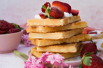 Homemade belgian Waffle. Strawberies and whiped cream.