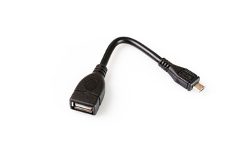 Black USB-OTG adapter cable connector on white background. Close up
