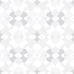 Abstract floral geometric seamless pattern . Kaleidoscopic, light white and grey colored shapes.