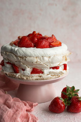 Cake with strawberries. Pastel background.