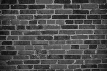 The brick texture, wall, with cracks and scratches can be used as a background
