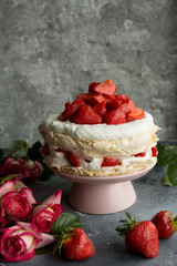 Homemade Pavlova meringue cake with strawberries.