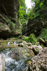 View of the waterfall in Caucasian mountains