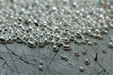 Closeup of a drop of silver for the manufacture of handmade jewelry