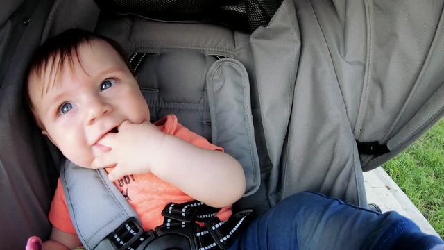 Baby boy in a stroller