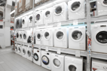 Close up blurred concept of DIY shopping center megamall with Appliances. Goods for home. Merchandising. Commercial LED lighting.