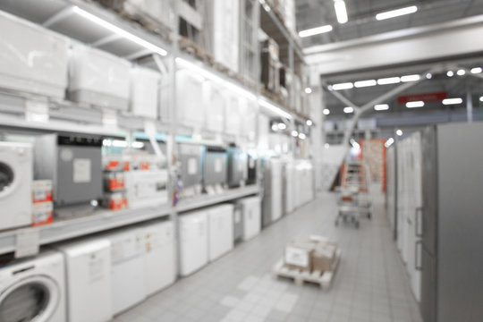 Close up blurred concept of DIY shopping center megamall with Appliances. Goods for home. Merchandising. Commercial LED lighting.