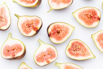 Fig fruits isolated on white background. Top view. Flat lay pattern