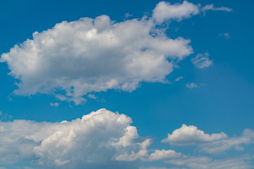 White clouds against the blue sky