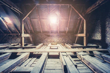 roof beams in attic / loft before renovation / construction