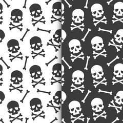 Set of seamless, endless patterns black skulls on a white background and white skulls on black background.