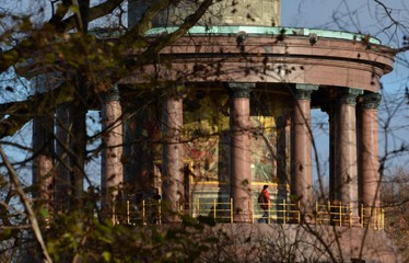 Fototapeta na wymiar Victory Column, (Siegessäule) in Great Tiergarten at the big star in Berlin Mitte in beautiful golden evening light from November 28, 2016, Germany