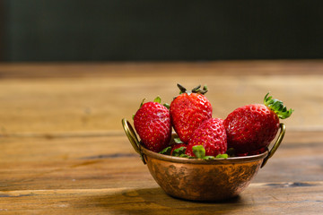 strawberry in the copper pot