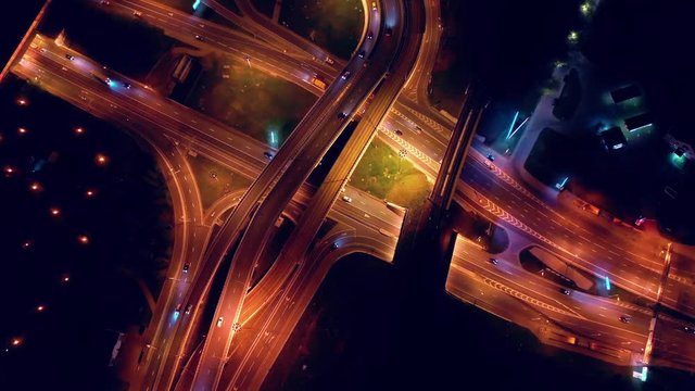 Night Aerial view of a freeway intersection traffic trails in night Moscow