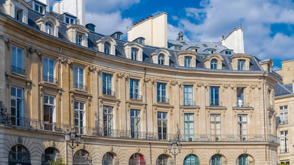      Paris, the place des Victoires, typical parisian facades and windows 
