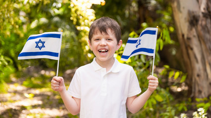 Israeli Happy Boy Hold and Waving Israeli Flag On Independence Day