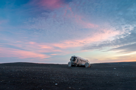 The abandoned DC-3 Airplane on Solheimasandur beach. Airplane wreckage on black sand beach. Douglas Dakota DC3, US navy, South Iceland.