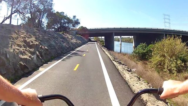 Bicycle Riding San Gabriel River Bikeway Under 405 Freeway