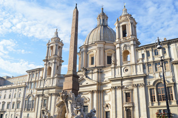 Fototapeta na wymiar Santa Agnese, in Piazza Navona, Rome. Project by Francesco Borromini. And Quattre Fiumi, by Gian Lorenzo Bernini