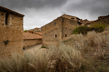 Fototapeta na wymiar old houses in Villarroya de los Pinares, province of Teruel, Aragon, Spain