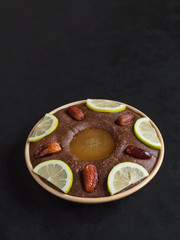 Saudi Arabia traditional dish Hineni, it is a mixed of dates and whole wheat. Ramadan food