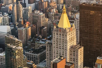 Fotobehang New York City Manhattan street aerial view with skyscrapers, pedestrian and busy traffic. View from Empire State Building © nikolas_jkd