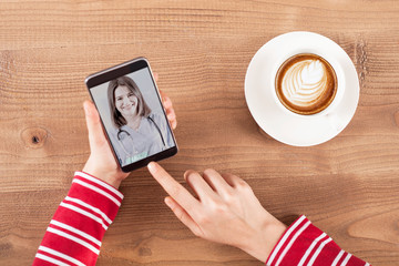 Woman connected to mobil application clinic 