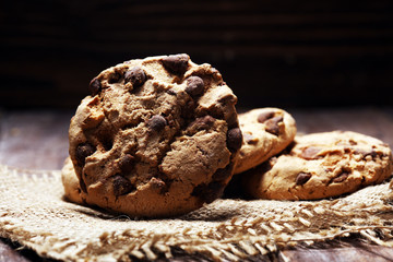 Chocolate cookies on wooden table. Chocolate chip cookies shot very delicious