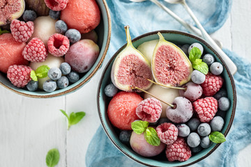 Cold ice cream sorbet with berries and watermelon