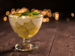 shortbread cake with cream dessert in a glass container