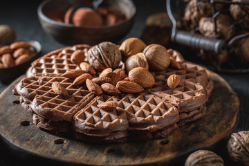 Homemade waffles with dark chocolate and nuts