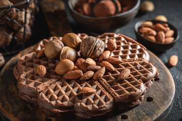Delicious waffles made of cocoa with almonds