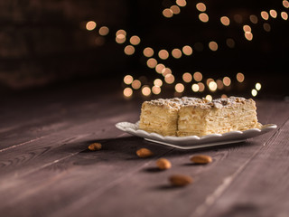 sand cake layered on a white saucer