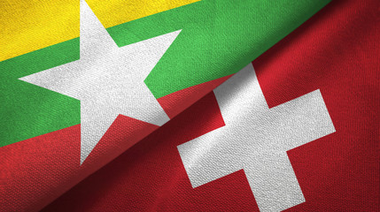 Myanmar and Switzerland two flags textile cloth, fabric texture