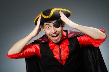 Man pirate against dark background