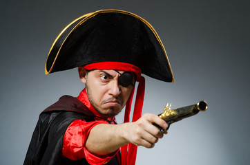 Man pirate against dark background