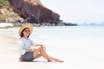 Young women traveling relax on the beach on summer, Concept beach on summer