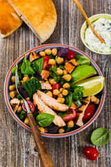 Mediterranean Grilled Chicken Salad with Chickpea or Garbanzo Beans. Selective focus.