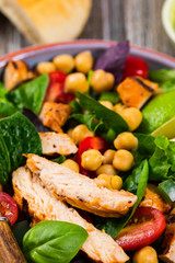 Mediterranean Grilled Chicken Salad with Chickpea or Garbanzo Beans. Selective focus.