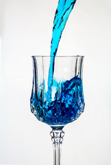 Pouring water into a fancy glass