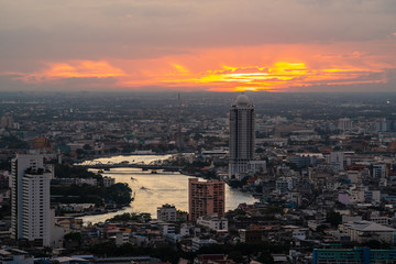 beautiful sunset cityscape of Bangkok city tower downtown at night  , landscape Thailand