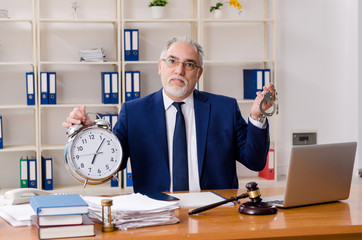 Aged lawyer working in the courthouse  