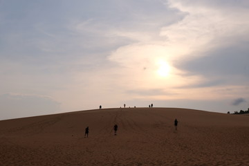 beautiful red sand dunes on sunset