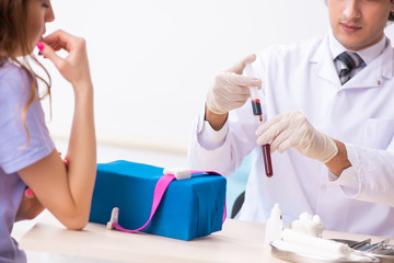 Female patient during blood test sampling procedure 