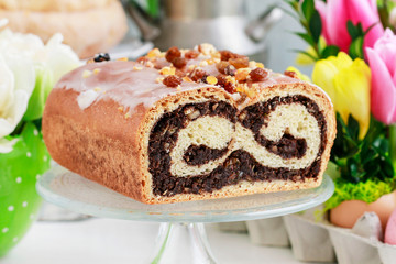 Poppy seed cake on easter table.