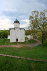 Spring view of white church of St. George, courtyard of Staraya Ladoga fortress, Russia